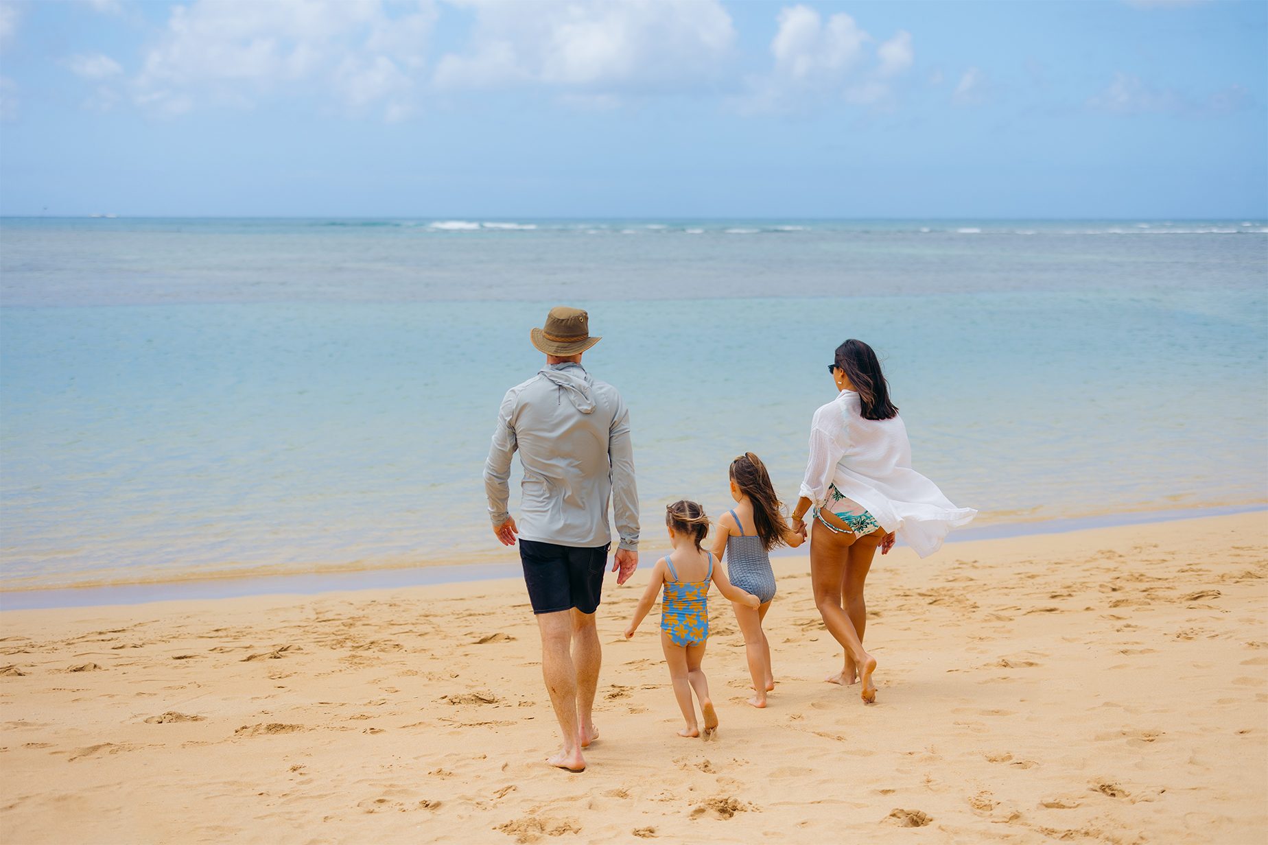 family walking on beach