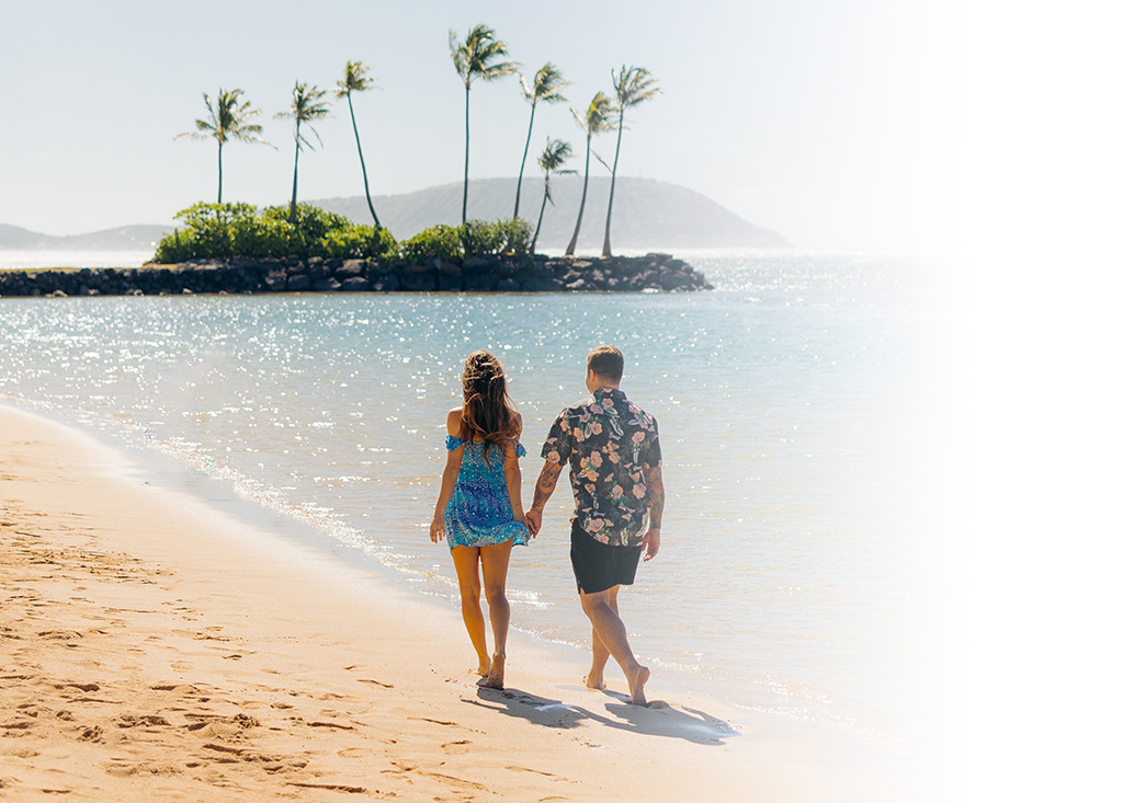 A couple walking on the beach